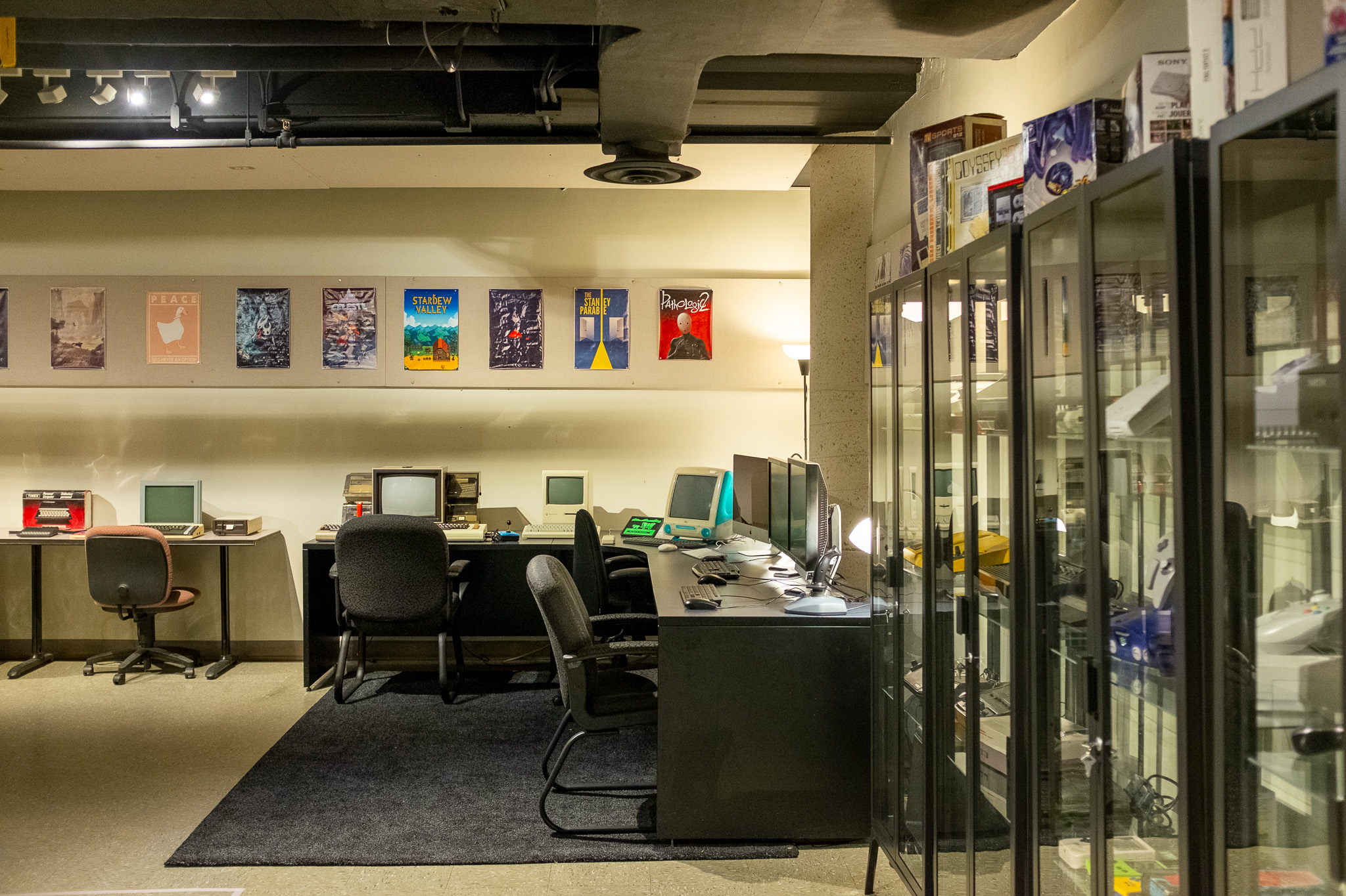 view of the ACCP lab with concoles, computers, and posters